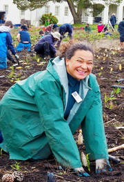 A participant gives a big smile during Presidio Planting Day