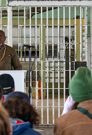 A formerly incarcerated speaker lectures in the Alcatraz Dining Hall