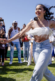 A dancer dances amongst the crowd at the Presidio Tunnel Tops.